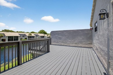 Nestled within a gated community, this 3 bedroom 2.5 bath on Boca Delray Golf and Country Club in Florida - for sale on GolfHomes.com, golf home, golf lot