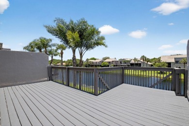 Nestled within a gated community, this 3 bedroom 2.5 bath on Boca Delray Golf and Country Club in Florida - for sale on GolfHomes.com, golf home, golf lot