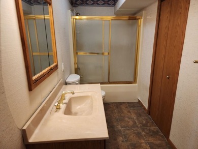 Don't miss this beautifully updated home in the highly on Dakota Dunes Country Club in South Dakota - for sale on GolfHomes.com, golf home, golf lot