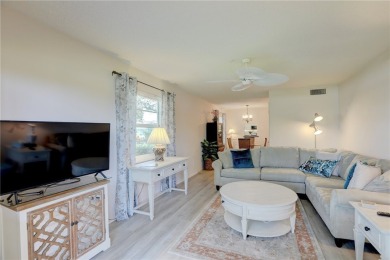 Adorable, updated 2BR/2BA first-floor unit in Vista Royale, a on The American Golf Club in Florida - for sale on GolfHomes.com, golf home, golf lot