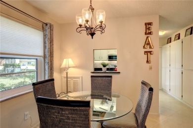 Adorable, updated 2BR/2BA first-floor unit in Vista Royale, a on The American Golf Club in Florida - for sale on GolfHomes.com, golf home, golf lot