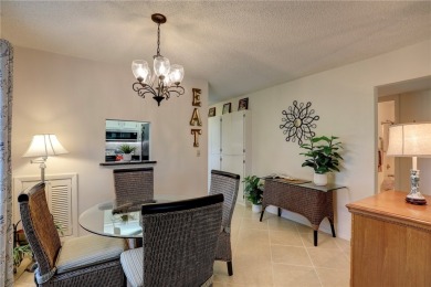 Adorable, updated 2BR/2BA first-floor unit in Vista Royale, a on The American Golf Club in Florida - for sale on GolfHomes.com, golf home, golf lot