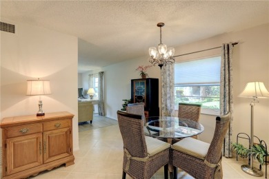 Adorable, updated 2BR/2BA first-floor unit in Vista Royale, a on The American Golf Club in Florida - for sale on GolfHomes.com, golf home, golf lot
