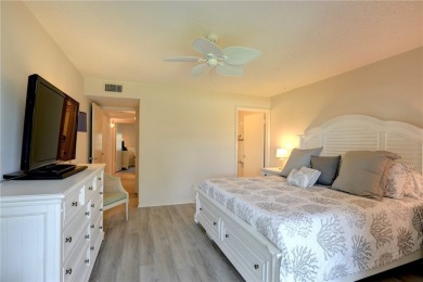 Adorable, updated 2BR/2BA first-floor unit in Vista Royale, a on The American Golf Club in Florida - for sale on GolfHomes.com, golf home, golf lot