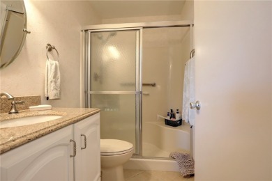 Adorable, updated 2BR/2BA first-floor unit in Vista Royale, a on The American Golf Club in Florida - for sale on GolfHomes.com, golf home, golf lot