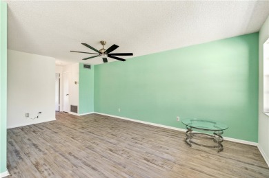 Retirement just got an upgrade! Enjoy carefree living in this on The American Golf Club in Florida - for sale on GolfHomes.com, golf home, golf lot