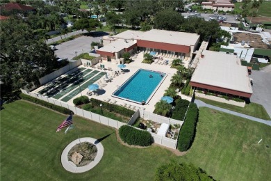 Adorable, updated 2BR/2BA first-floor unit in Vista Royale, a on The American Golf Club in Florida - for sale on GolfHomes.com, golf home, golf lot