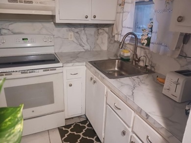Beautiful, 2 bedroom, 2 bath in Sunrise Lakes. This property has on Sunrise Lakes Phase III in Florida - for sale on GolfHomes.com, golf home, golf lot
