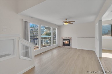 Discover this waterfront retreat with easy walkout to shoreline on Seasons Ridge At Four Seasons in Missouri - for sale on GolfHomes.com, golf home, golf lot