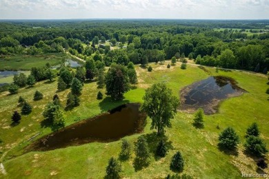 123+ Acres with a Lake, 2 Pole Barns, a Club House & a 2 Bed/2 on Arcadia Hills Golf Course in Michigan - for sale on GolfHomes.com, golf home, golf lot