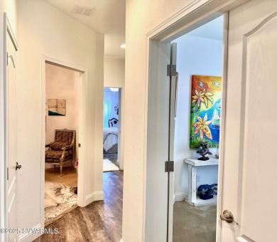 Welcome to this immaculate Gold Standard Coronado model home -- on Pine Shadows Golf Course in Arizona - for sale on GolfHomes.com, golf home, golf lot