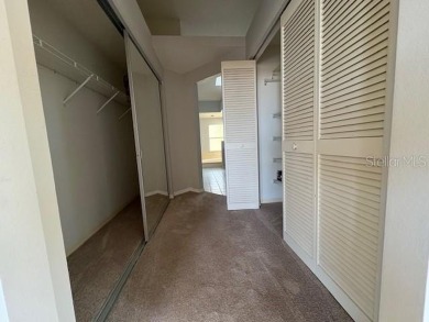 Light and bright 3BED/2BA Condominium with attached garage on East Lake Woodlands Country Club in Florida - for sale on GolfHomes.com, golf home, golf lot