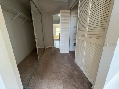 Light and bright 3BED/2BA Condominium with attached garage on East Lake Woodlands Country Club in Florida - for sale on GolfHomes.com, golf home, golf lot