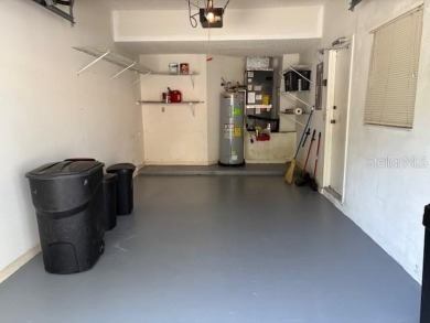 Light and bright 3BED/2BA Condominium with attached garage on East Lake Woodlands Country Club in Florida - for sale on GolfHomes.com, golf home, golf lot