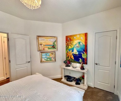 Welcome to this immaculate Gold Standard Coronado model home -- on Pine Shadows Golf Course in Arizona - for sale on GolfHomes.com, golf home, golf lot