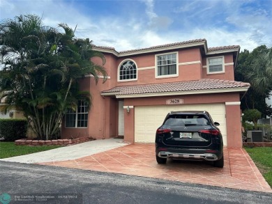 Discover this elegant 2-story residence in the highly on Palm-Aire Country Club and Resort - The Oaks in Florida - for sale on GolfHomes.com, golf home, golf lot