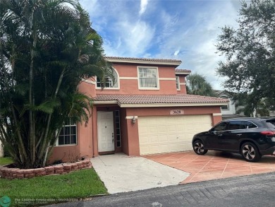 Discover this elegant 2-story residence in the highly on Palm-Aire Country Club and Resort - The Oaks in Florida - for sale on GolfHomes.com, golf home, golf lot