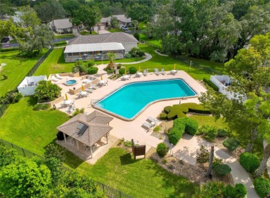 Welcome home to maintenance free living at this outstanding and on Heather Golf and Country Club in Florida - for sale on GolfHomes.com, golf home, golf lot