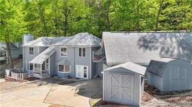 Discover this waterfront retreat with easy walkout to shoreline on Seasons Ridge At Four Seasons in Missouri - for sale on GolfHomes.com, golf home, golf lot