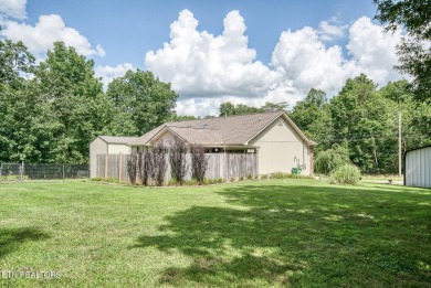 Welcome to your dream home where comfort meets functionality in on Lake Tansi Village Country Club in Tennessee - for sale on GolfHomes.com, golf home, golf lot