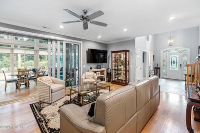 Welcome to 704 Squire Lane, where timeless elegance meets modern on Porters Neck Country Club in North Carolina - for sale on GolfHomes.com, golf home, golf lot