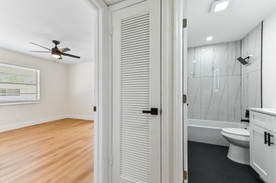 Enjoy breathtaking golf course and water views from this on Kings Point Golf -Flanders Way in Florida - for sale on GolfHomes.com, golf home, golf lot