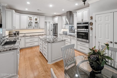 Welcome to 704 Squire Lane, where timeless elegance meets modern on Porters Neck Country Club in North Carolina - for sale on GolfHomes.com, golf home, golf lot