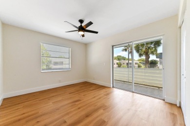 Enjoy breathtaking golf course and water views from this on Kings Point Golf -Flanders Way in Florida - for sale on GolfHomes.com, golf home, golf lot