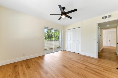 Enjoy breathtaking golf course and water views from this on Kings Point Golf -Flanders Way in Florida - for sale on GolfHomes.com, golf home, golf lot