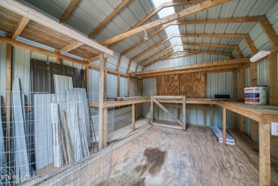 Welcome to your dream home where comfort meets functionality in on Lake Tansi Village Country Club in Tennessee - for sale on GolfHomes.com, golf home, golf lot