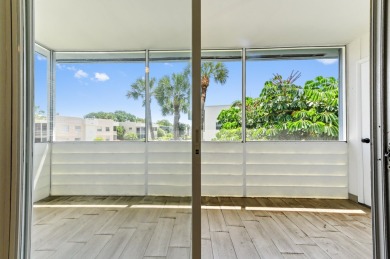 Enjoy breathtaking golf course and water views from this on Kings Point Golf -Flanders Way in Florida - for sale on GolfHomes.com, golf home, golf lot