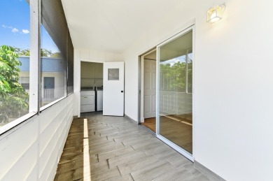 Enjoy breathtaking golf course and water views from this on Kings Point Golf -Flanders Way in Florida - for sale on GolfHomes.com, golf home, golf lot