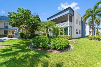 Enjoy breathtaking golf course and water views from this on Kings Point Golf -Flanders Way in Florida - for sale on GolfHomes.com, golf home, golf lot