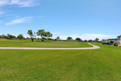 Enjoy breathtaking golf course and water views from this on Kings Point Golf -Flanders Way in Florida - for sale on GolfHomes.com, golf home, golf lot