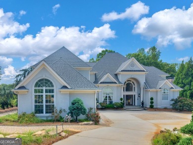 This exquisite family home is the epitome of luxury living on Eagles Landing Country Club in Georgia - for sale on GolfHomes.com, golf home, golf lot