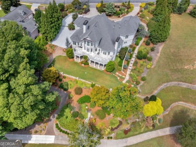 This exquisite family home is the epitome of luxury living on Eagles Landing Country Club in Georgia - for sale on GolfHomes.com, golf home, golf lot