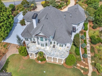 This exquisite family home is the epitome of luxury living on Eagles Landing Country Club in Georgia - for sale on GolfHomes.com, golf home, golf lot