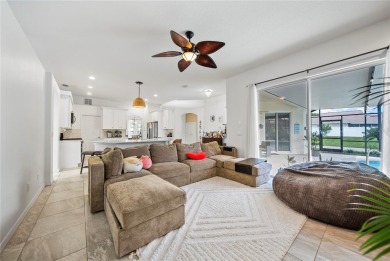 Welcome to your dream oasis! This stunning 4-bedroom, 3-bath on The Oasis Club at Champions Gate in Florida - for sale on GolfHomes.com, golf home, golf lot
