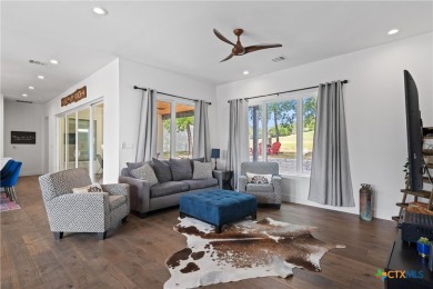 Stunning, modern-contemporary Point Venture home nestled just on Point Venture Golf Club on Lake Travis in Texas - for sale on GolfHomes.com, golf home, golf lot