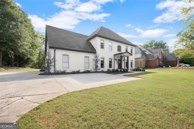 Absolutely stunning two-story home situated on the 6th fairway on Royal Lakes Golf and Country Club in Georgia - for sale on GolfHomes.com, golf home, golf lot