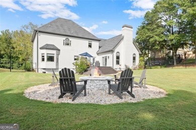 Absolutely stunning two-story home situated on the 6th fairway on Royal Lakes Golf and Country Club in Georgia - for sale on GolfHomes.com, golf home, golf lot