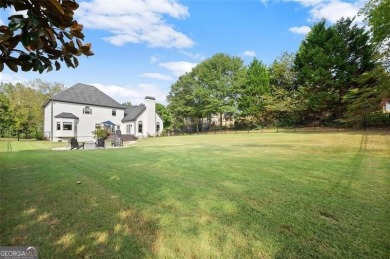 Absolutely stunning two-story home situated on the 6th fairway on Royal Lakes Golf and Country Club in Georgia - for sale on GolfHomes.com, golf home, golf lot