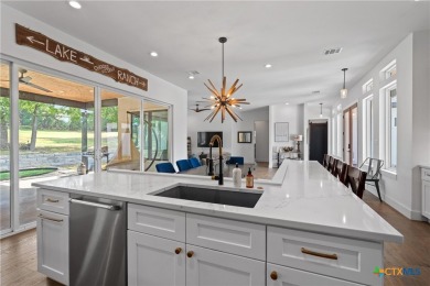 Stunning, modern-contemporary Point Venture home nestled just on Point Venture Golf Club on Lake Travis in Texas - for sale on GolfHomes.com, golf home, golf lot