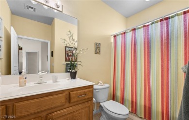 This immaculate, fully furnished townhome sits above the 15th on Wolf Creek At Paradise Canyon in Nevada - for sale on GolfHomes.com, golf home, golf lot
