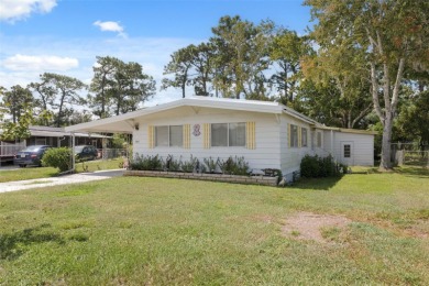 This 2 bedroom, 2 bath home with a covered carport wraps you in on High Point Golf Club, Inc. in Florida - for sale on GolfHomes.com, golf home, golf lot