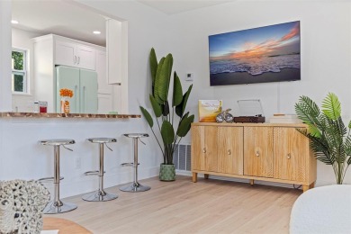 A One-of-a-Kind Dunedin Gem. Step into timeless charm with The on The Dunedin Country Club in Florida - for sale on GolfHomes.com, golf home, golf lot