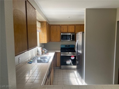 SPACIOUS TOWNHOUSE WITH 2 CAR GARAGE !  UNIQUE COMMUNITY THAT on Las Vegas National Golf Club in Nevada - for sale on GolfHomes.com, golf home, golf lot