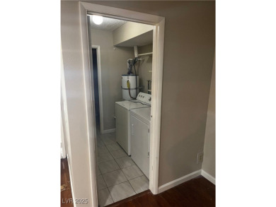 SPACIOUS TOWNHOUSE WITH 2 CAR GARAGE !  UNIQUE COMMUNITY THAT on Las Vegas National Golf Club in Nevada - for sale on GolfHomes.com, golf home, golf lot