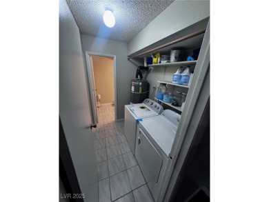 SPACIOUS TOWNHOUSE WITH 2 CAR GARAGE !  UNIQUE COMMUNITY THAT on Las Vegas National Golf Club in Nevada - for sale on GolfHomes.com, golf home, golf lot