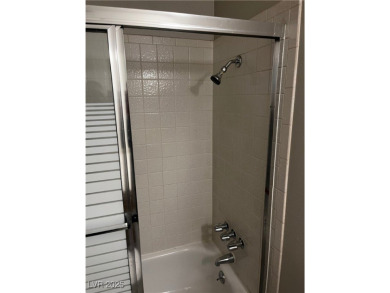 SPACIOUS TOWNHOUSE WITH 2 CAR GARAGE !  UNIQUE COMMUNITY THAT on Las Vegas National Golf Club in Nevada - for sale on GolfHomes.com, golf home, golf lot